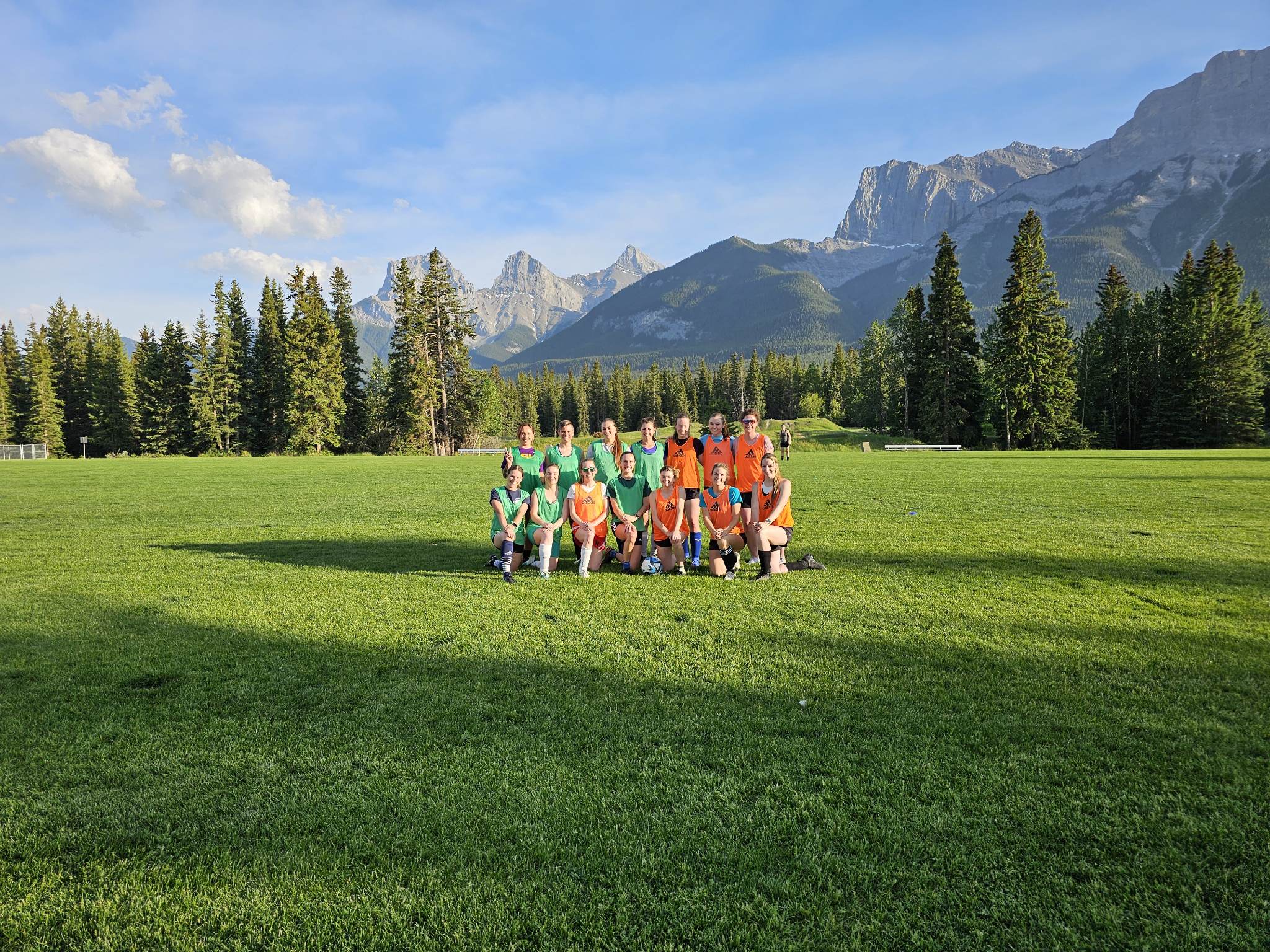 photo of Hannah's soccer team on green grass in Canmore Alberta